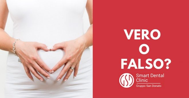 dentista-gravidanza-vero-falso donna incinta che crea con le mani la forma di un cuore sulla sua pancia