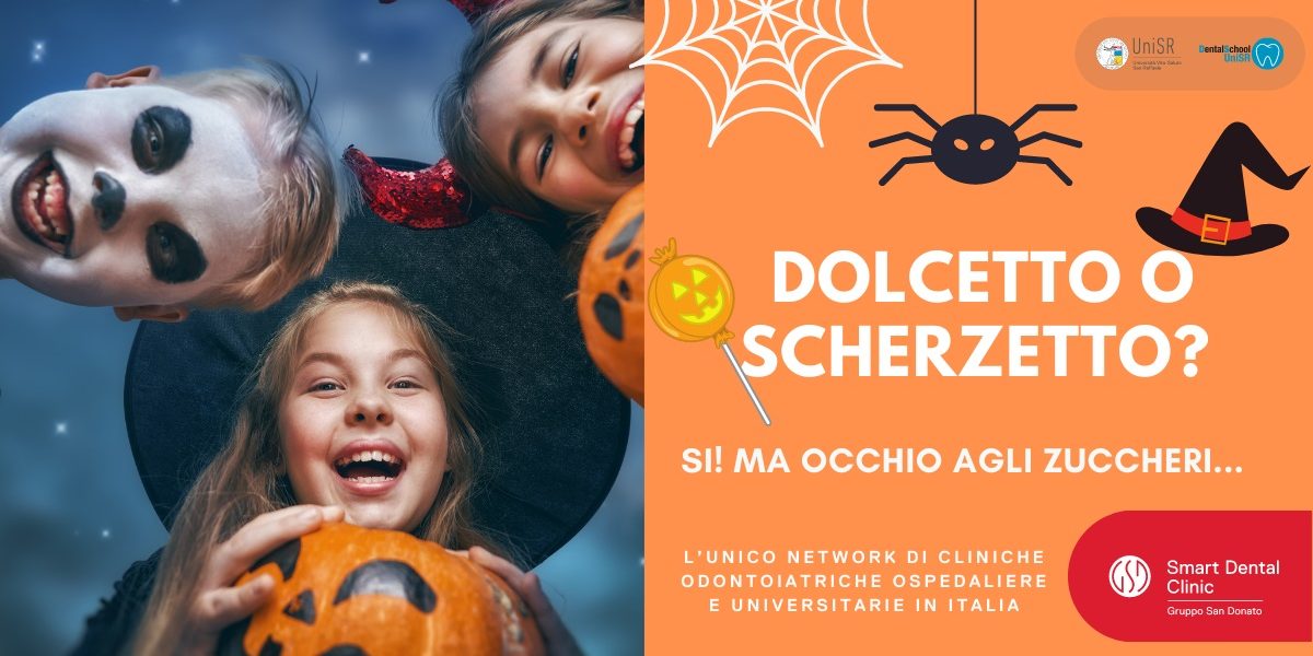 tre bambini sorridenti travestiti per Halloween con zucche e accessori