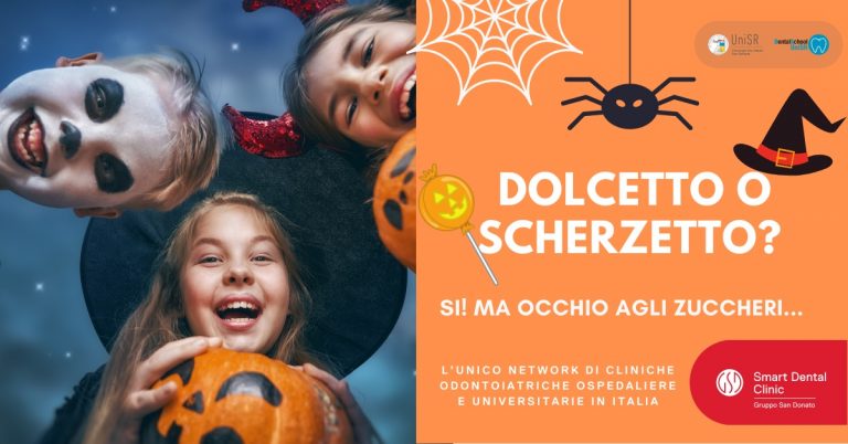 tre bambini sorridenti travestiti per Halloween con zucche e accessori